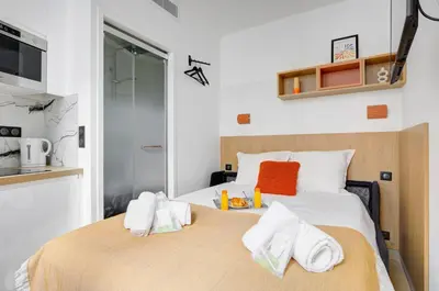 Un ou plusieurs lits dans un hébergement de l'établissement Bluestay 289 - Superbe studio à Paris