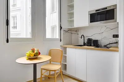 Cuisine ou kitchenette dans l'établissement Bluestay 289 - Superbe studio à Paris