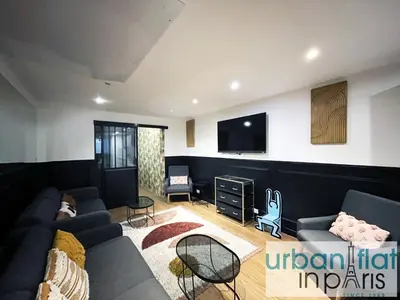 Télévision ou salle de divertissement dans l'établissement Urban Flat 31 - Charming Triplex in Paris