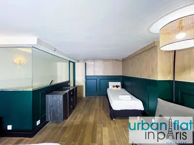 Un ou plusieurs lits dans un hébergement de l'établissement Urban Flat 31 - Charming Triplex in Paris