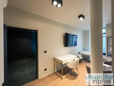 Télévision ou salle de divertissement dans l'établissement Urban Flat 97 - Spacious 1 Bedroom in Paris
