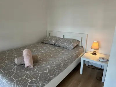 Un ou plusieurs lits dans un hébergement de l'établissement Hermoso apartamento a 10 minutos De la Torre Eiffel