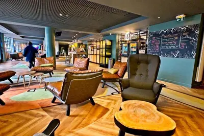 Coin salon dans l'établissement Paris Porte de Versailles Cosy Lodge 2 Appart hôtel parking wifi 4 pers
