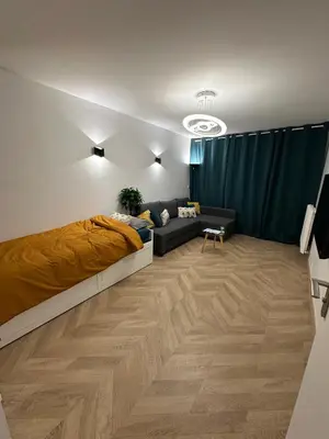 Coin salon dans l'établissement PARIS-MONTROUGE Magnifique appartement- très cosy pour 1 - 6 personnes refait à NEUF -ENTIRE APARTMENT LUXURIOUS AND WARM -Montrouge Paris 14ème - Proche Aéroport Orly Parc Expositions Porte de Versailles FREE WIFI GRATUIT