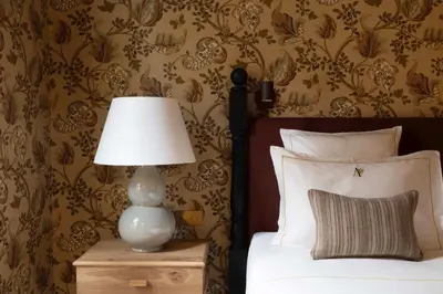 Un ou plusieurs lits dans un hébergement de l'établissement Hôtel Aubépine