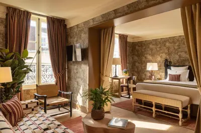 Un ou plusieurs lits dans un hébergement de l'établissement Hôtel Aubépine