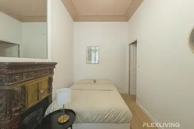 Un ou plusieurs lits dans un hébergement de l'établissement Flexliving - 99 Felix Faure - Room