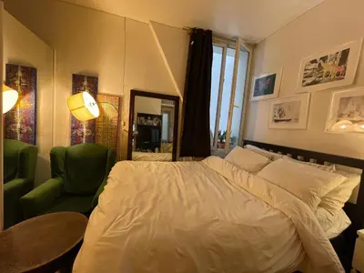 Un ou plusieurs lits dans un hébergement de l'établissement Appartement Paris