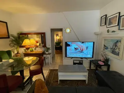 Télévision ou salle de divertissement dans l'établissement Appartement Paris