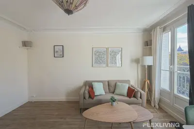 Coin salon dans l'établissement Flexliving - whole apartment - Monge