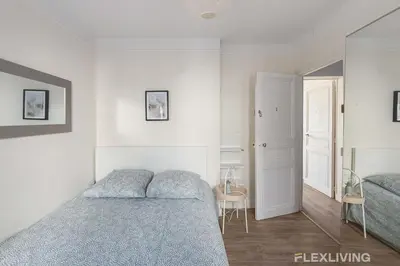Un ou plusieurs lits dans un hébergement de l'établissement Flexliving - whole apartment - Monge