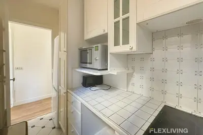 Cuisine ou kitchenette dans l'établissement Flexliving - whole apartment - Monge