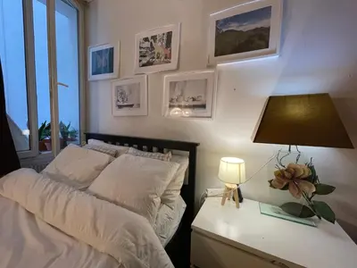 Un ou plusieurs lits dans un hébergement de l'établissement Appartement Paris arrondissement 10