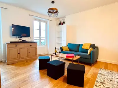 Télévision ou salle de divertissement dans l'établissement Le Penthouse Chevalier - L