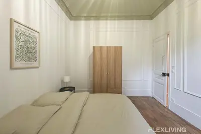 Un ou plusieurs lits dans un hébergement de l'établissement Flexliving - 99 Felix Faure - Room