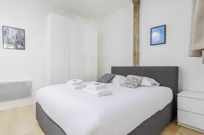 Un ou plusieurs lits dans un hébergement de l'établissement Loft d'Exception pour 6 Personnes - Voltaire 11e