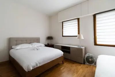 Un ou plusieurs lits dans un hébergement de l'établissement Appartement 2 personnes proche Beaugrenelle - II