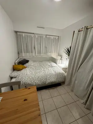 Un ou plusieurs lits dans un hébergement de l'établissement Studio Paris 20e