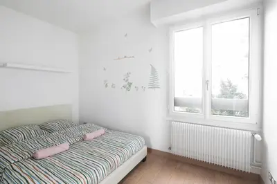 Un ou plusieurs lits dans un hébergement de l'établissement Lumineux 2 chambres avec Terrasse