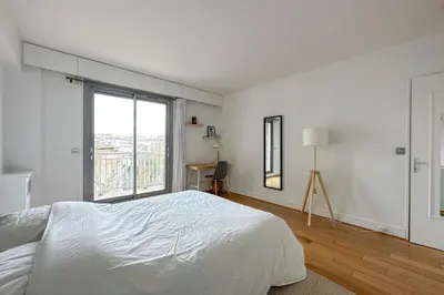 Un ou plusieurs lits dans un hébergement de l'établissement Flexliving - room - Ternes
