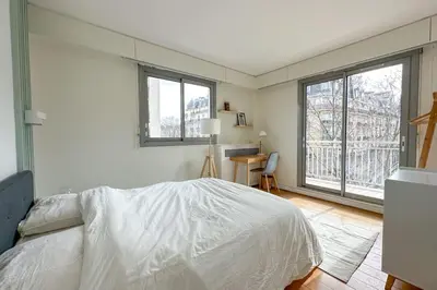 Un ou plusieurs lits dans un hébergement de l'établissement Flexliving - room - Ternes