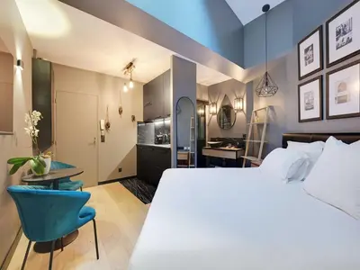 Un ou plusieurs lits dans un hébergement de l'établissement Charming studio -2P- Auteuil