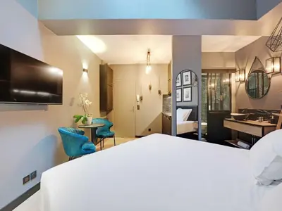 Un ou plusieurs lits dans un hébergement de l'établissement Charming studio -2P- Auteuil