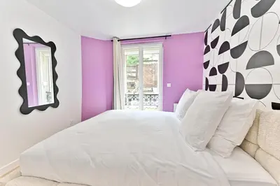 Un ou plusieurs lits dans un hébergement de l'établissement Maisonette 5 minutes from Paris - Levallois - II