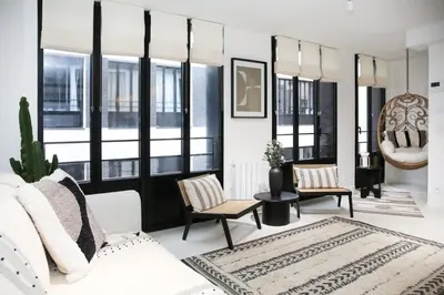 Coin salon dans l'établissement Elegance et confort pres du Marais Cosy - 4P