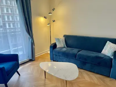 Coin salon dans l'établissement Large studio apartment Invalides Montparnasse