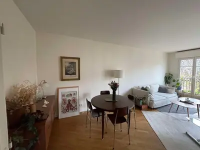 Un ou plusieurs lits dans un hébergement de l'établissement Spacious and bright apartment - Canal St-Martin