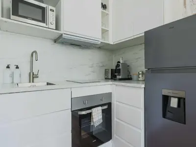 Cuisine ou kitchenette dans l'établissement Charming apartment-1BR-3P-Ternes