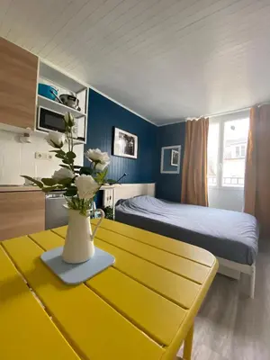 Un ou plusieurs lits dans un hébergement de l'établissement Beautiful Studio