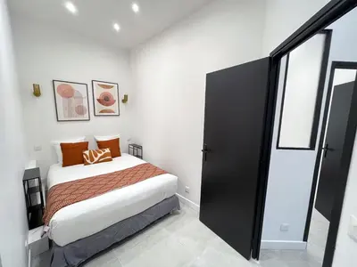 Un ou plusieurs lits dans un hébergement de l'établissement 08 - Design Flat Republique