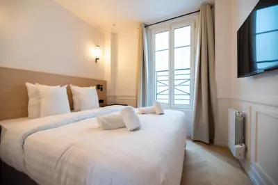 Un ou plusieurs lits dans un hébergement de l'établissement Lovely Flat in Austerlitz - Bastille