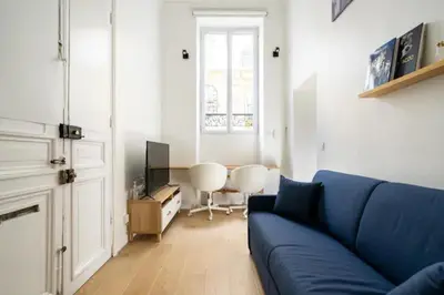 Télévision ou salle de divertissement dans l'établissement Paris 9e Loft