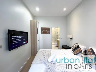 Un ou plusieurs lits dans un hébergement de l'établissement Urban Flat 64 - Luxury flat Mermoz - Champs Elysees