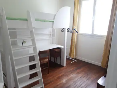 Un ou plusieurs lits dans un hébergement de l'établissement Vincennes - Parisian appartment