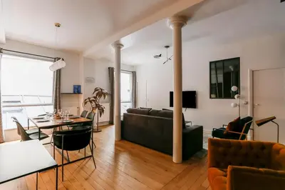 Coin salon dans l'établissement Marvelous 2 bedrooms - Saint Honore - Palais Royal