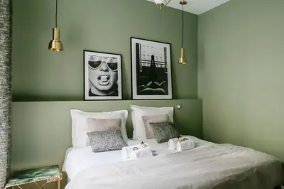 Un ou plusieurs lits dans un hébergement de l'établissement Marvelous 2 bedrooms - Saint Honore - Palais Royal