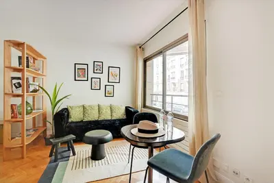 Coin salon dans l'établissement Charmant studio au cœur de Levallois-Perret