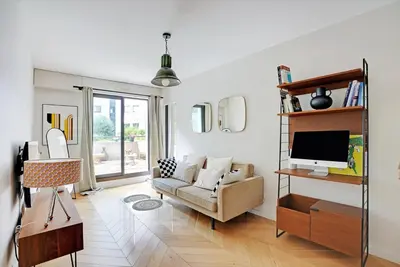 Coin salon dans l'établissement Appartement spacieux avec terrasse proche hôpital américain