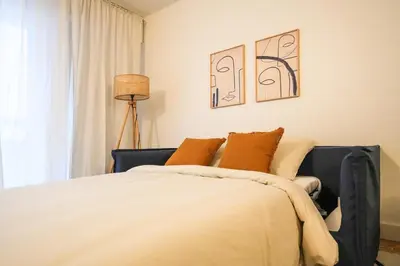 Un ou plusieurs lits dans un hébergement de l'établissement Cozy apartment in Paris 15 & Eiffel Tower
