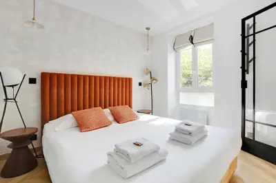 Un ou plusieurs lits dans un hébergement de l'établissement Luxury Appartement 6p L001