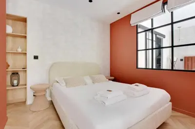 Un ou plusieurs lits dans un hébergement de l'établissement Luxury Appartement 6p L001