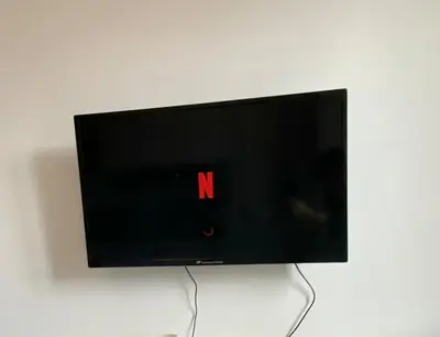 Télévision ou salle de divertissement dans l'établissement New 124 Suite Anouck - Cosy Apartment Paris Center