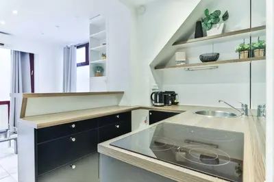 Cuisine ou kitchenette dans l'établissement Cozy apartment - 1BR 4P - Eiffel Tower