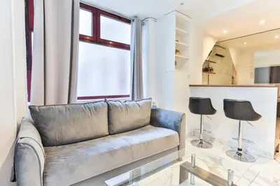 Coin salon dans l'établissement Charming 1BR 4P - Eiffel Tower Trocadero