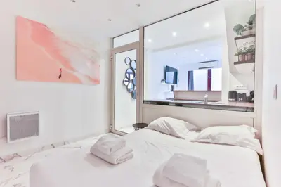 Un ou plusieurs lits dans un hébergement de l'établissement Charming 1BR 4P - Eiffel Tower Trocadero
