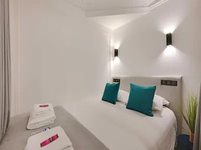 Un ou plusieurs lits dans un hébergement de l'établissement Charming apartment - 2BR 6P - Gare Saint-Lazare